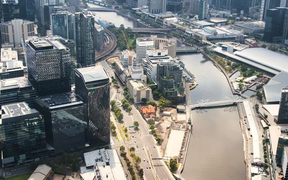 An aerial view of a city along a river