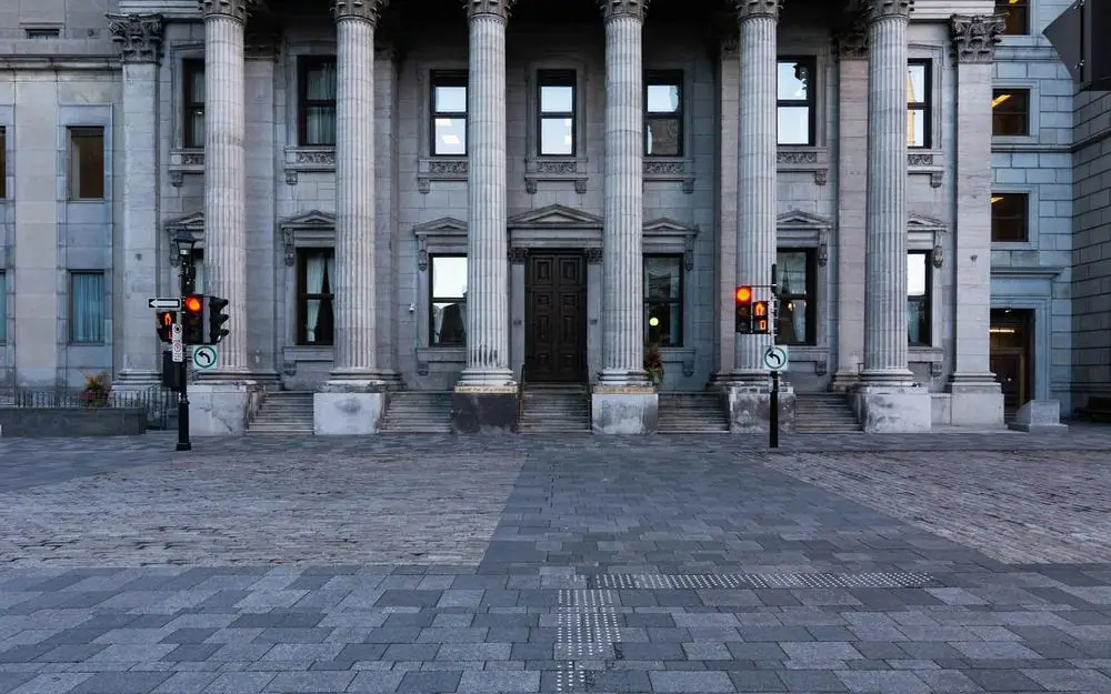 The columned front of a bank building
