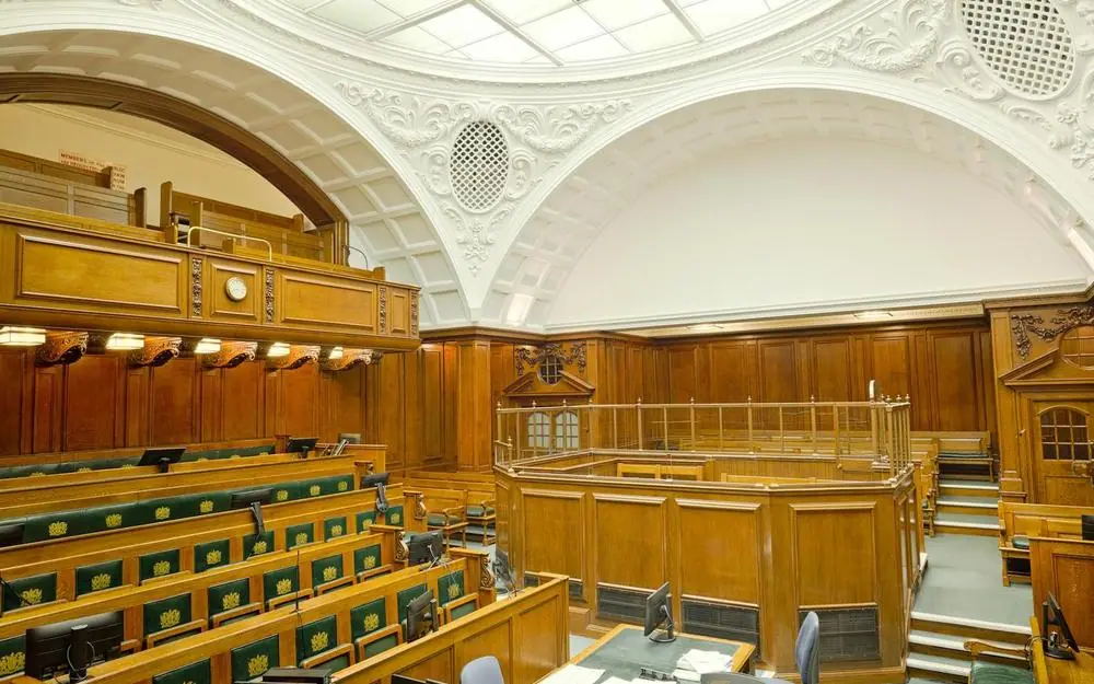 A wood-panelled courtroom