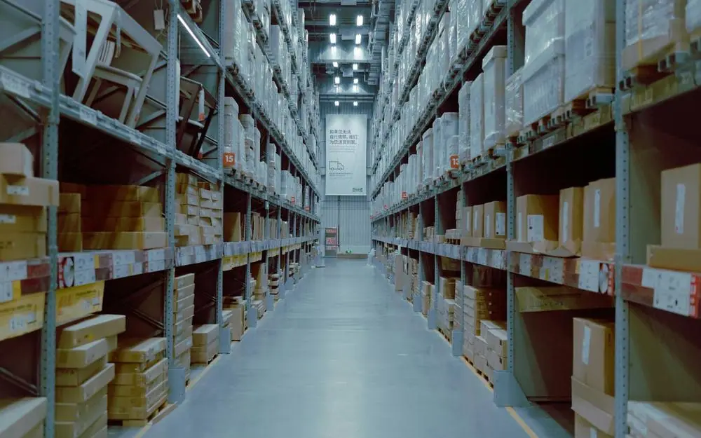 A warehouse aisle lined with stock